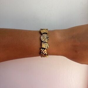 GOLD TONE COLLEGE GRADUATION THEMED SLIDING CHARM BRACELET